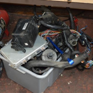 One of the boxes of parts stripped from the engine.